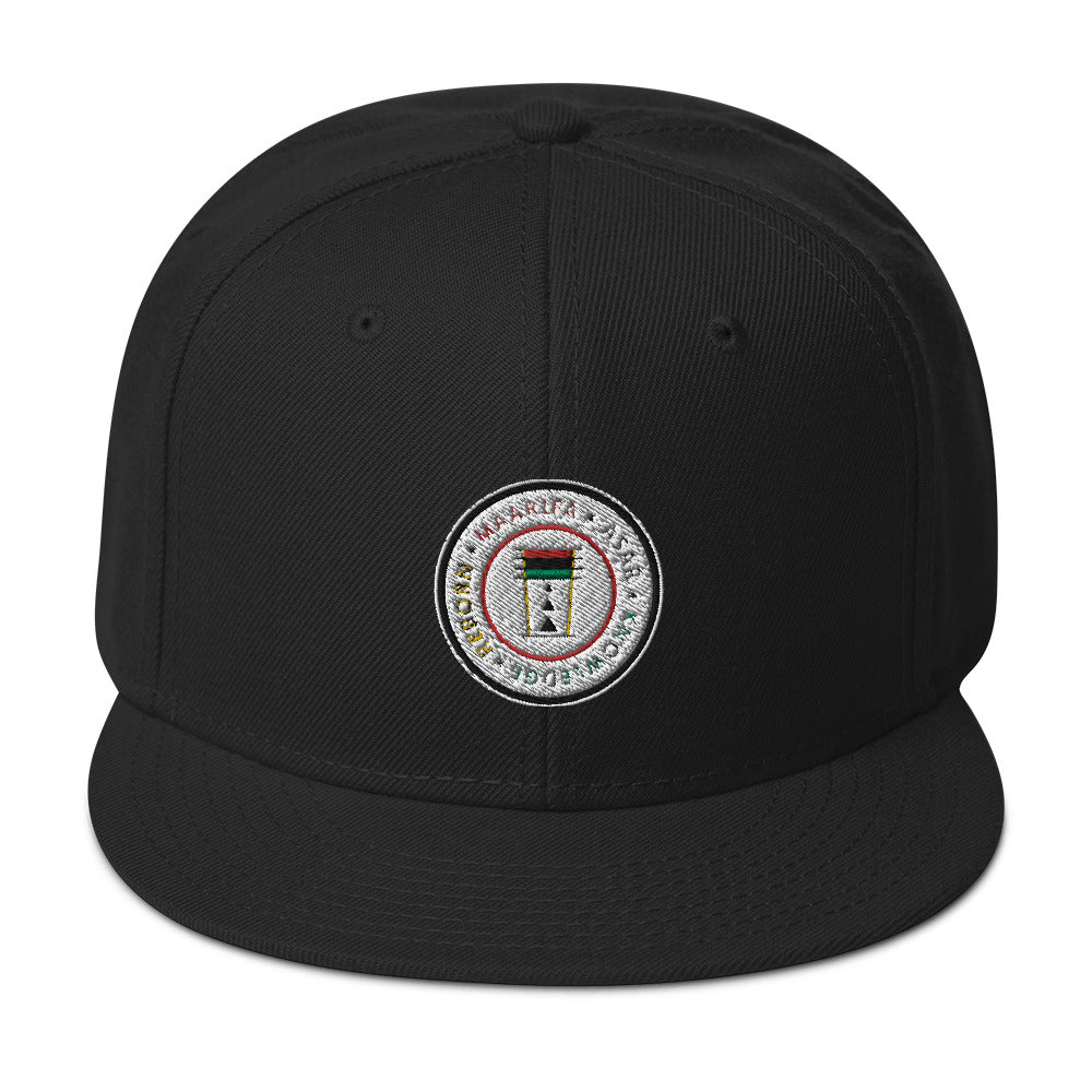 This is the snapback hat of your dreams! It's structured and high-profile, with a flat visor and a subtle grey under visor.   • 85% acrylic, 15% wool • Structured, 6-panel, high-profile • Plastic snap closure • Grey under visor • Head circumference: 22”–24”